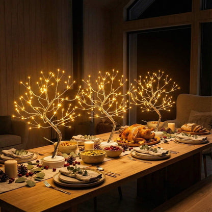 Baśniowe światła na wysokie drzewo